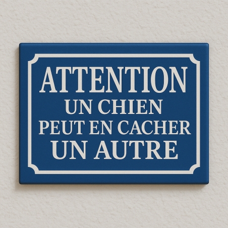 Plaque de rue UN CHIEN PEUT EN CACHER UN AUTRE